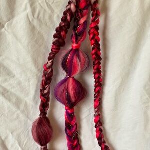Playful Pink and Purple Braided Hair Accessory